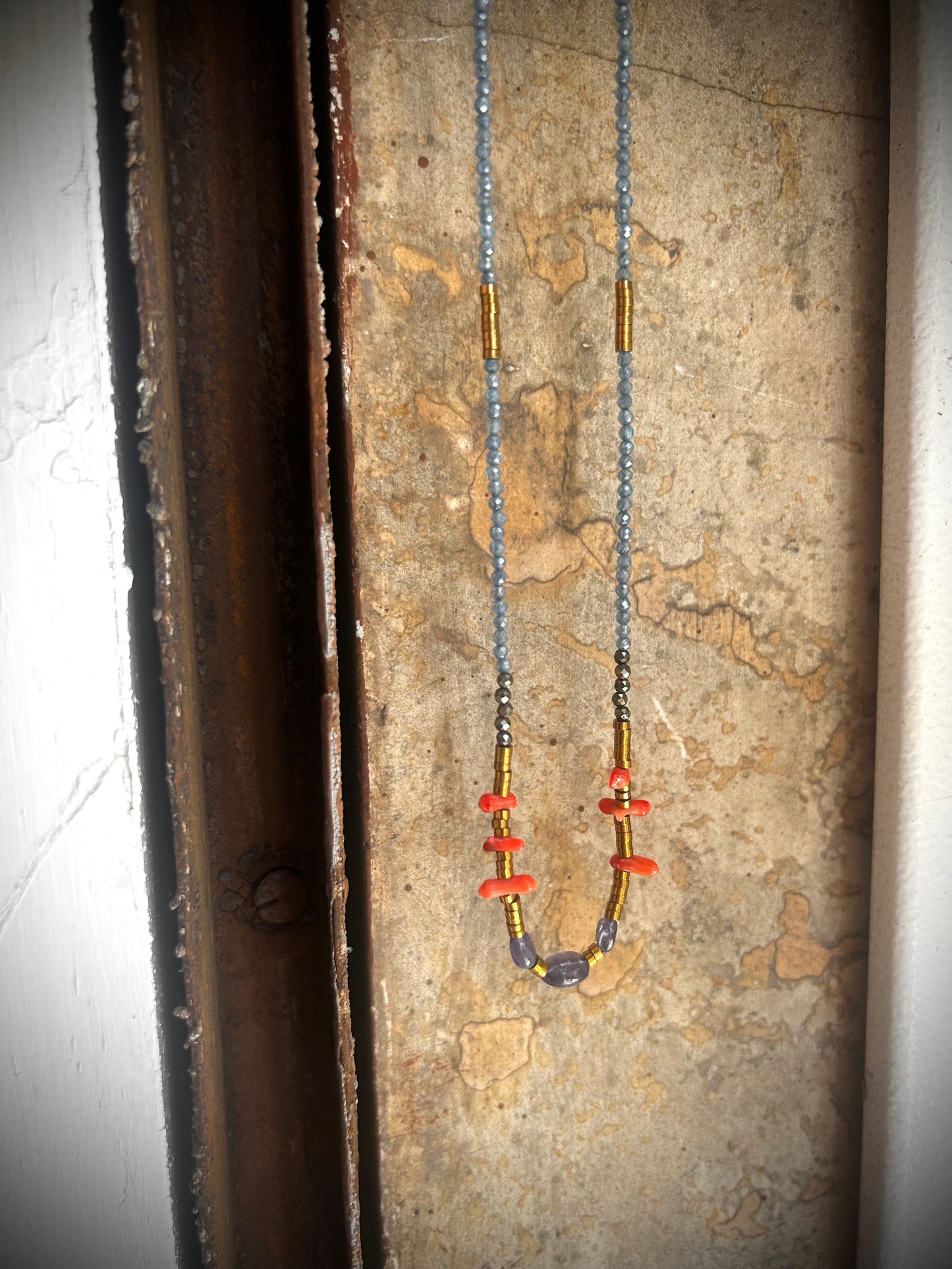 CO-06 IOLITE/CORALLO